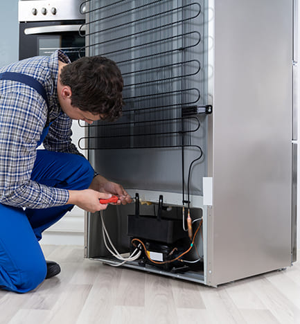 Professional Technician Repairing Refrigerator Service in Chennai- Home Appliance Care